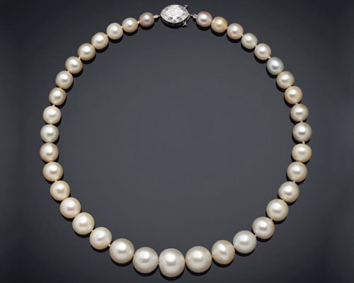 cartier pearl necklace story